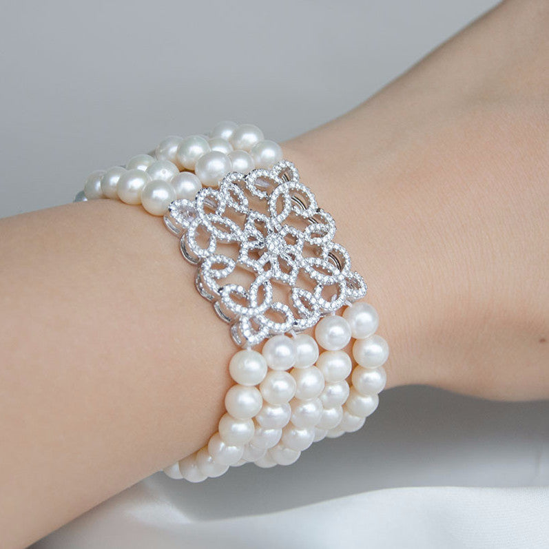 Fresh water 10mm pearls bracelet with a silver magnetic ball clasp